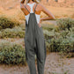 DOUBLE TAKE Full Size Sleeveless V-Neck Pocketed Jumpsuit at Bella Road