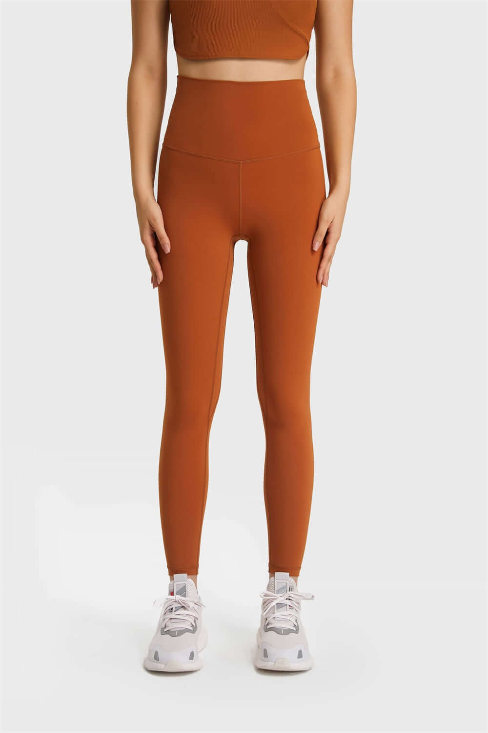 Millennia Ultra Soft High Waist Leggings in rust, perfect for yoga and athleisure styles.