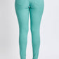 Back view of mint green Hyperstretch Mid-Rise Skinny Pants by YMI Jeans, showcasing sleek and flexible fit for versatile style.