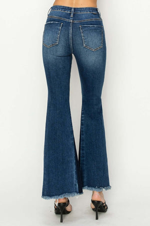 Back view of high rise side shadow seam detail slit flare jeans by Risen Jeans, showcasing flared legs and stylish slit detail.