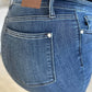 Close-up of High Waist Distressed Skinny Jeans back pocket, showing the details of the Judy Blue Jeans design and denim texture.