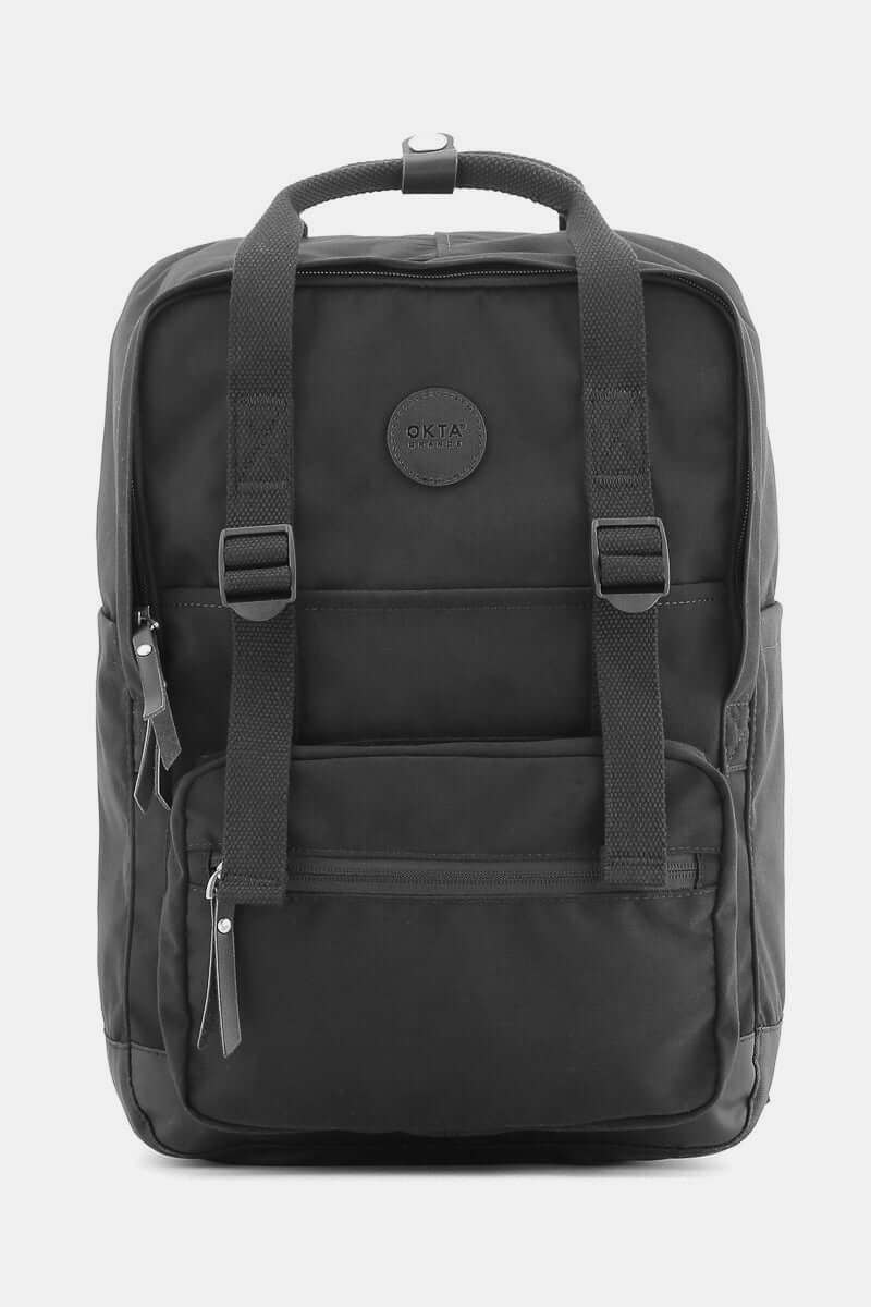 Stylish black canvas backpack with durable straps and front pocket, ideal for adventures and everyday use.