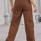 Woman wearing Baeful Long Straight Leg Jeans with Pockets in brown color.