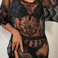 Woman wearing a black lace round neck half sleeve cover-up.