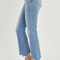 Frayed hem cropped straight Risen Jeans styled with heels for a chic casual look.