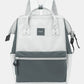 Himawari water-resistant canvas backpack in grey and white with side pockets, perfect for adventure and organization.