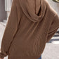 Woman wearing brown textured kangaroo pocket long sleeve hoodie with hood up in a casual outdoor setting.