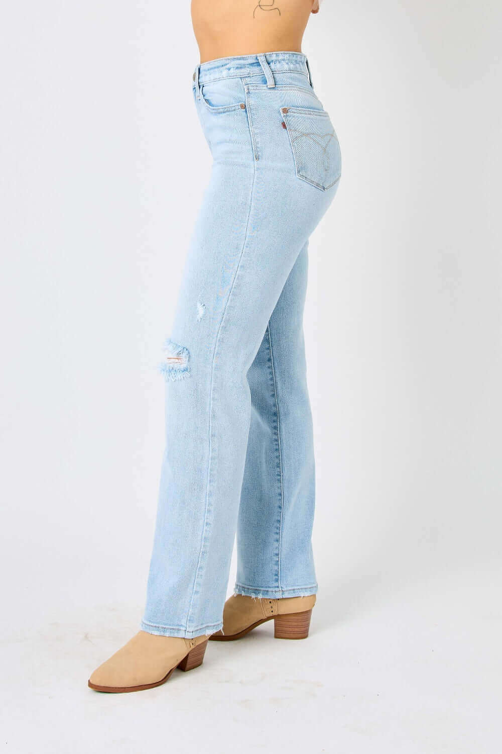 Side view of person wearing high waist distressed straight jeans by Judy Blue. Comfortable, durable, and flattering cut denim.