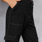 Woman wearing Baeful Long Straight Leg Jeans with Pockets in solid black, showcasing chic and casual style with flattering fit.