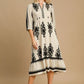 Stylish Umgee Printed Notched Midi Dress with chic print, notched neckline, and casual elegance, perfect for any occasion.