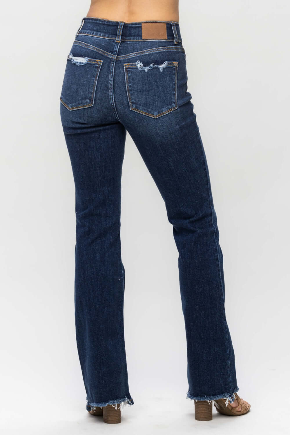 Frayed Hem Bootcut Jeans - Judy Blue Jeans back view showcasing distressed detailing and stylish, modern bootcut fit.