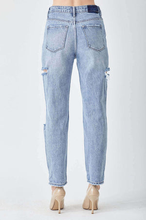 Back view of Risen Jeans distressed slim cropped jeans showing trendy distressed details and flattering slim fit design.