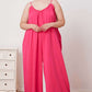 DOUBLE TAKE Full Size Ruffle Trim Tie Back Cami Jumpsuit with Pockets at Bella Road