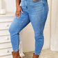 Woman wearing High Waist Skinny Jeans in medium ash wash with brown ankle boots, Judy Blue Jeans, flattering fit, and clean look.