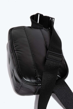 Quilted nylon crossbody bag in black, featuring a sturdy strap and sleek design, perfect for everyday use.