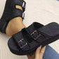 Bella Road Raw Hem Wedge Buckle Sandals in black, featuring stylish buckle design and comfortable mid-heel.