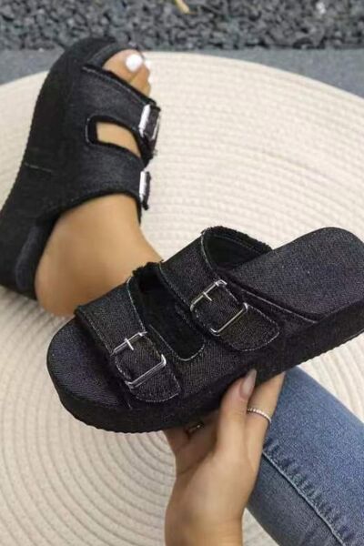 Bella Road Raw Hem Wedge Buckle Sandals in black, featuring stylish buckle design and comfortable mid-heel.