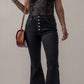 Woman wearing Bella Road Button-Fly Flare Jeans with Pockets, styled with a lace top and brown shoulder bag