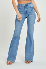 High Rise Raw Cut Hem Bootcut Jeans by Risen - Stylish and modern with a flattering high rise waist and trendy raw cut hem for an edgy touch.