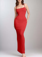 Woman wearing Basic Bae Built-In Shapewear Sleeveless Maxi Dress in red, showcasing enhanced curves and sleek silhouette