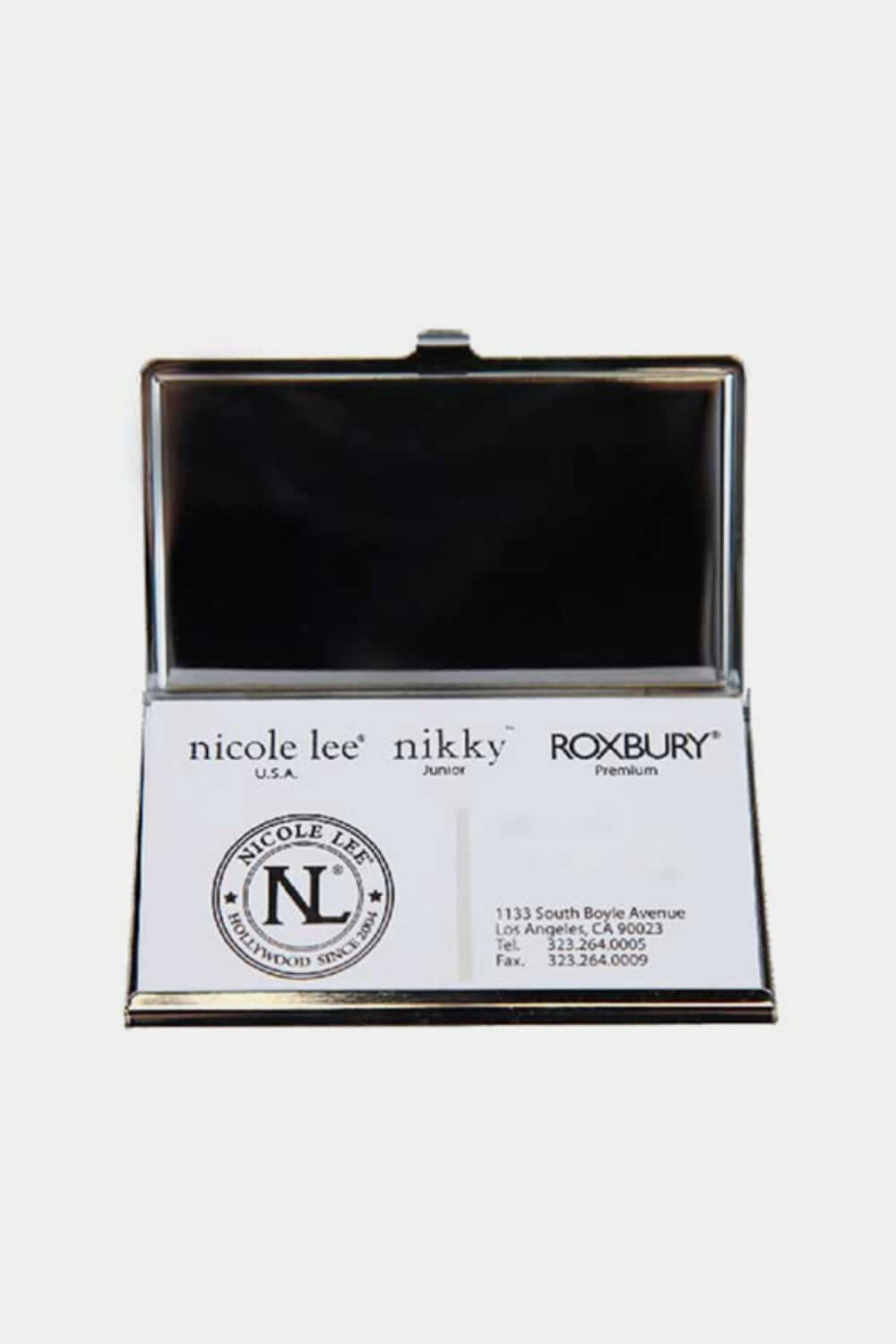 Open Nicole Lee USA printed business card case with business card inside