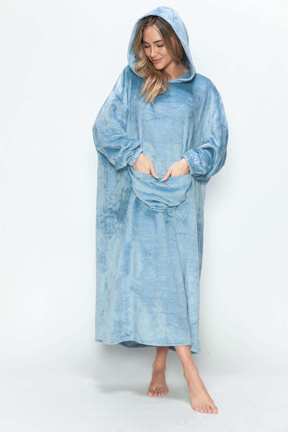 Cozy hooded midi lounge dress in soft blue, featuring pockets and a relaxed fit, perfect for chilly fall days.