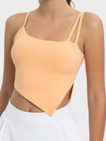 Millennia Slit Asymmetrical Neck Active Cami in soft peach, featuring stylish slit detail and dual straps for ultimate comfort.