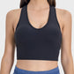 Black scoop neck active tank top with wide straps, perfect for workouts and casual wear, offering comfort and style.