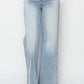 Stylish Risen high rise wide leg jeans with a retro flair in light wash, perfect for any occasion.