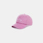 SALTY vintage washed baseball cap in pink with embroidered lettering, featuring a worn-in look and playful design, perfect for casual style.