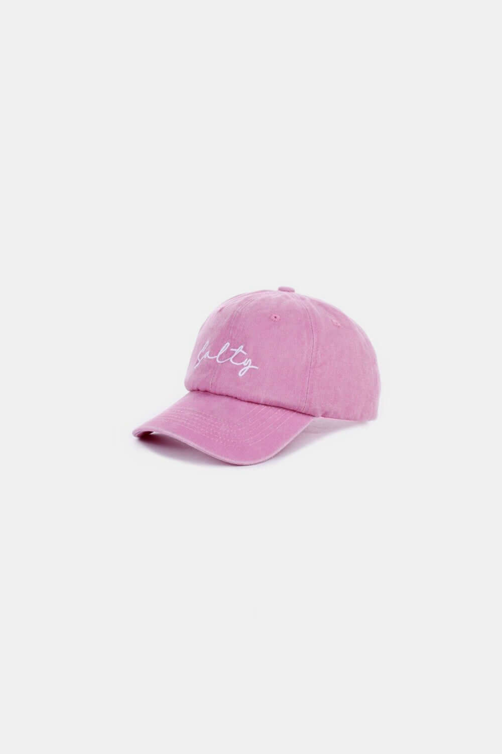 SALTY vintage washed baseball cap in pink with embroidered lettering, featuring a worn-in look and playful design, perfect for casual style.