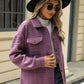 Woman wearing Bella Road Plaid Collared Neck Long Sleeve Jacket outside a building.