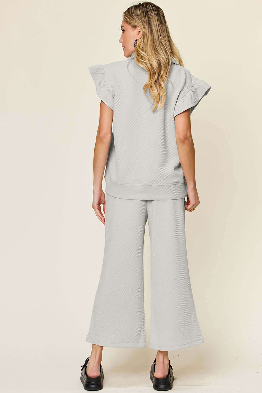 DOUBLE TAKE Texture Ruffle Short Sleeve Top and Drawstring Wide Leg Pants Set at Bella Road