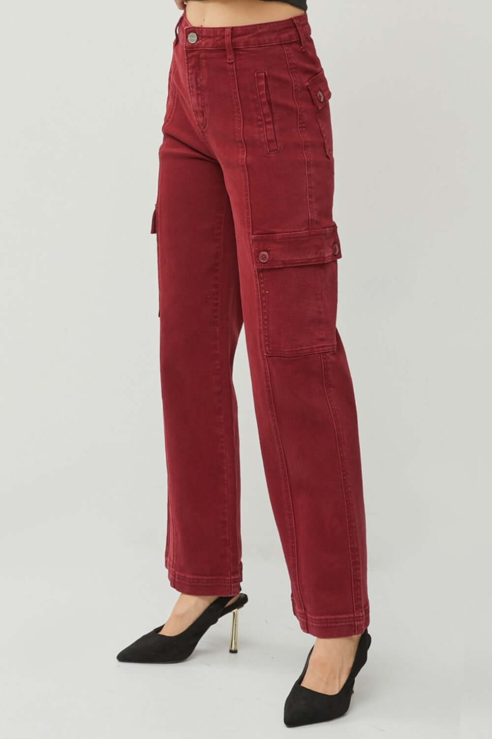 Trendy RISEN high-rise wide leg cargo jeans in red with buttoned cargo pockets, ideal for stylish casual outings.