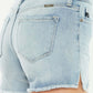 High Rise Side Slit Denim Shorts, back view showing side slit detailing and high-rise waist in light wash denim.