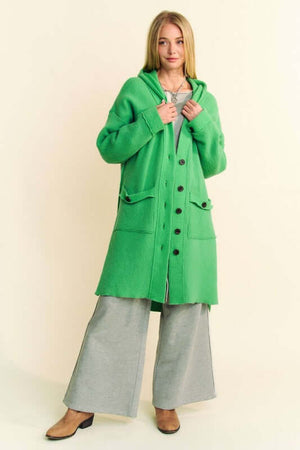 Stylish green Davi & Dani hooded cardigan with side slits, paired with gray wide-leg pants for a chic look.