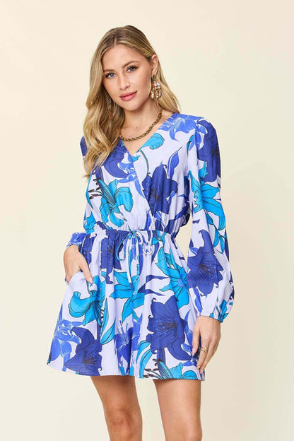 DOUBLE TAKE Full Size Floral Long Sleeve Romper with Pockets at Bella Road