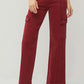 High rise wide leg cargo jeans in red, featuring practical pockets and stylish design for a chic and comfortable look.