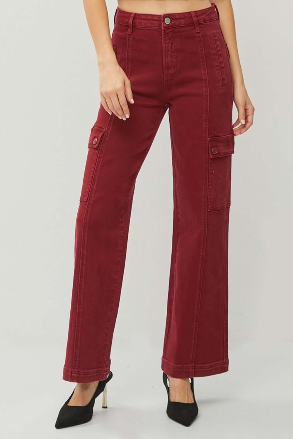 High rise wide leg cargo jeans in red, featuring practical pockets and stylish design for a chic and comfortable look.