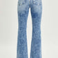 High Rise Distressed Flare Jeans by Risen Jeans in Light Wash, back view showcasing vintage-inspired style and retro 70s vibe