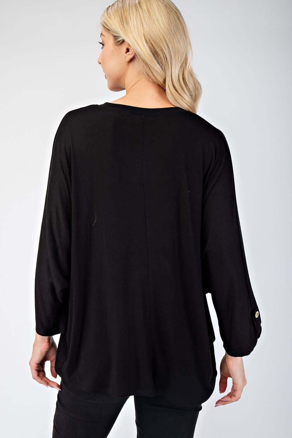 Back view of a stylish black blouse with three-quarter sleeves and button detail, perfect for any occasion.