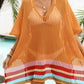 Woman wearing a slit openwork V-neck half sleeve cover-up with multicolor stripes, made of 100% polyester, perfect for beachwear.