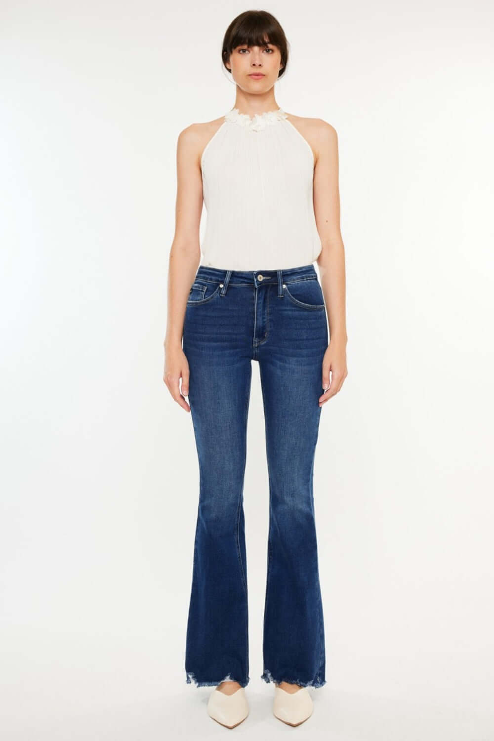 Fashion-forward individual wearing Cat's Whiskers Raw Hem Flare Jeans with edgy sophistication and retro vibe. Style #:KC11259D