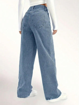 Person wearing Distressed Wide Leg Jeans with back pockets, showing relaxed wide leg fit and stylish distressed detailing.