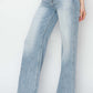 High rise wide leg jeans in light blue denim by Risen Jeans for a stylish and flattering look with a retro flair.