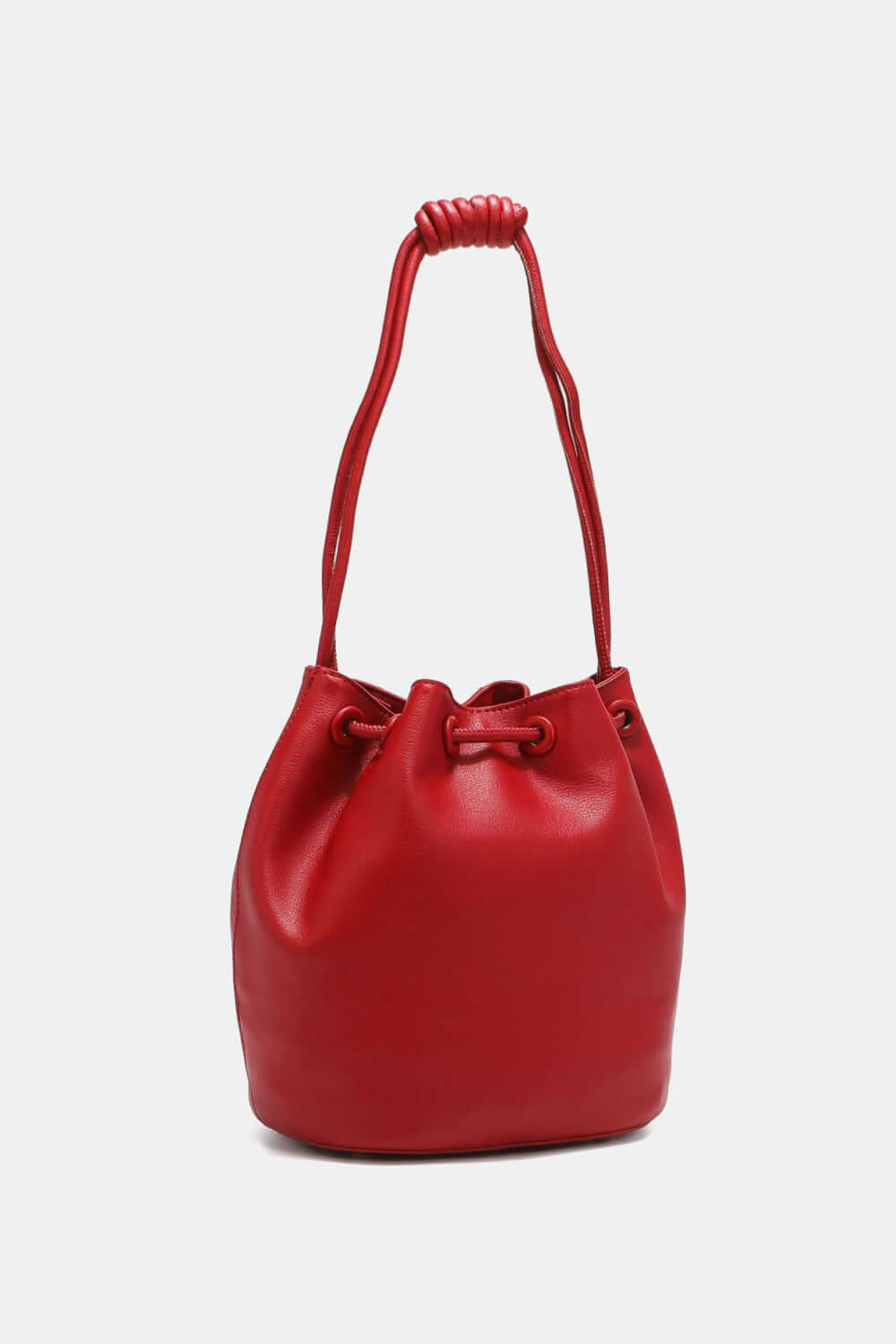 Red Nicole Lee USA Amy Studded Bucket Bag with drawstring closure crafted from high-quality pebbled vegan leather, front view.