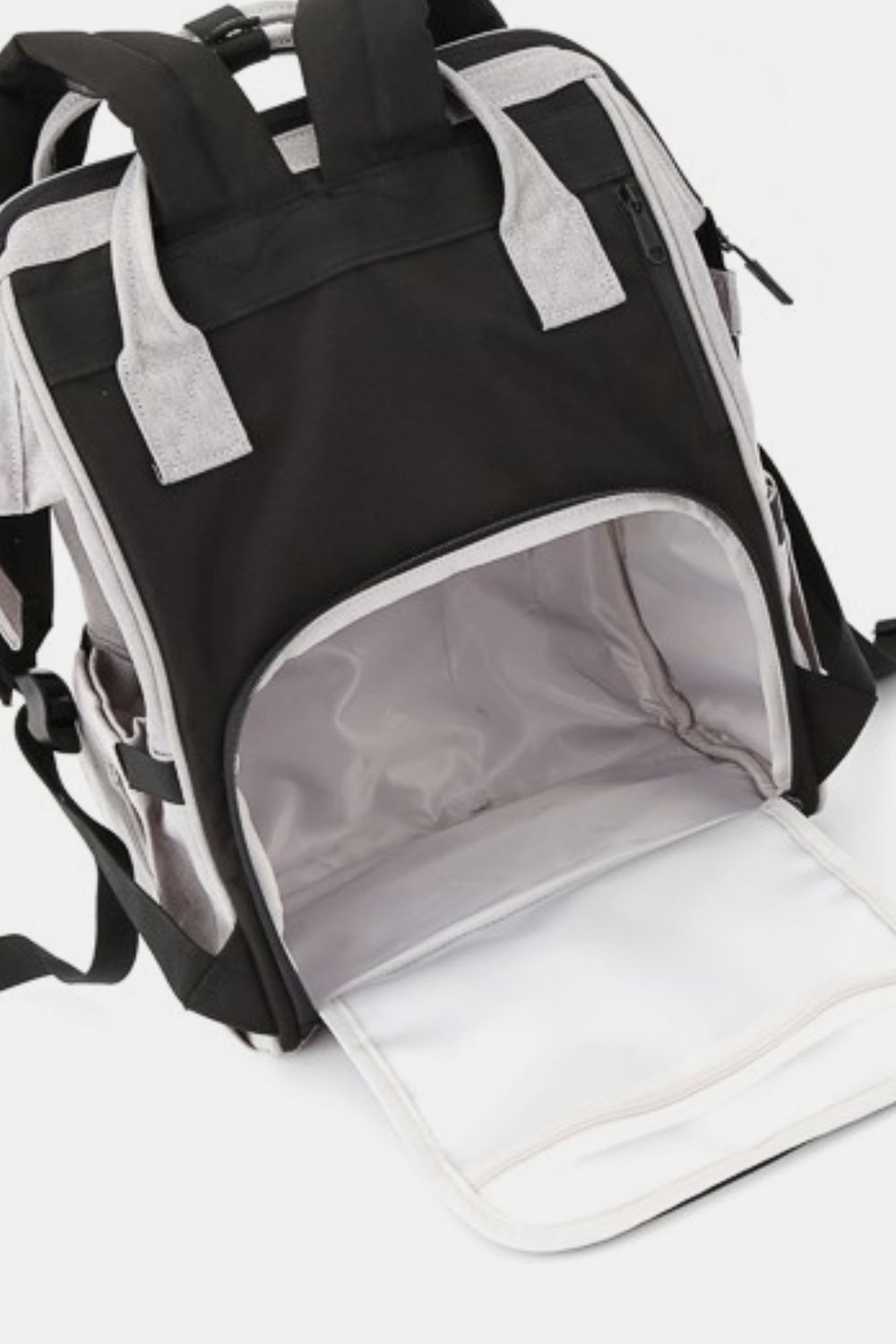 Himawari waterproof backpack with open main compartment, showcasing spacious interior and multilayer pockets for organized storage.