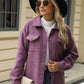 Woman wearing Bella Road Plaid Collared Neck Long Sleeve Jacket in purple with buttoned front and pockets, accessorized with black hat and sunglasses.