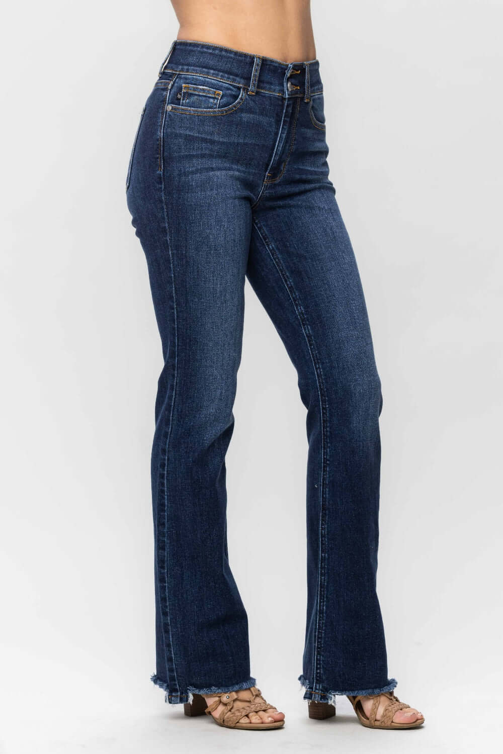 Frayed Hem Bootcut Jeans by Judy Blue Jeans displaying trendy, stylish denim with a flattering fit.