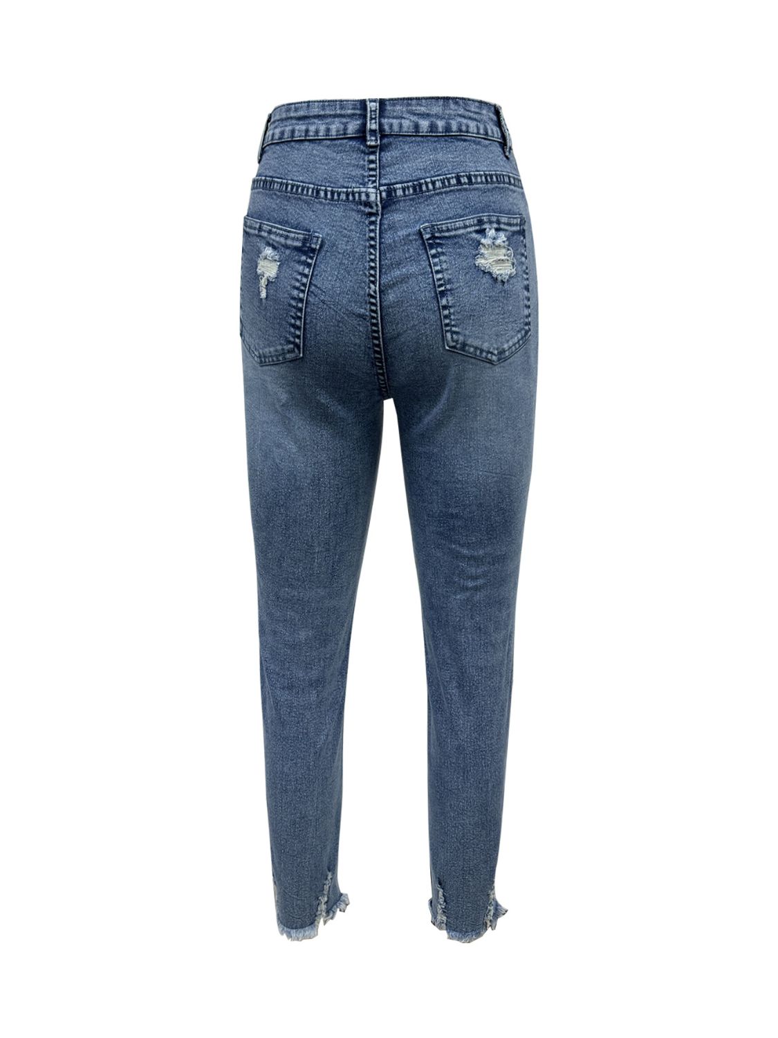 Bella Road Distressed Raw Hem Jeans with back pockets, showcasing edgy style and moderate stretch fabric. Perfect for fashion-forward looks!